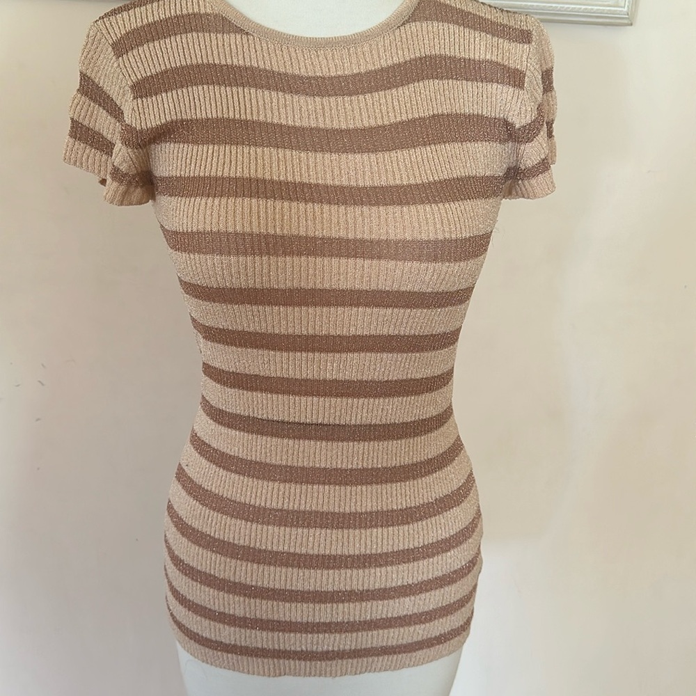 Bebe size M short sleeve metallic blouse.